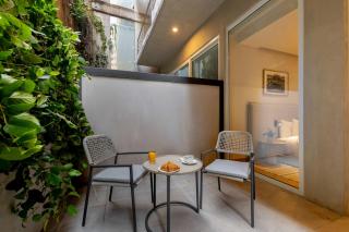 T02 Capitalia Cozy Studio with Gym and Rooftop Retreat - 7