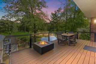 Modern Waterfront Retreat with Hot Tub & Pond Views - 5