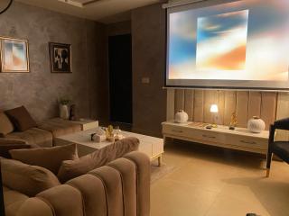 1BHK Apartment with Projector & Eiffel View Ideal Urban Retreat - 8