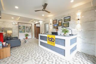 FabExpress Golden Grand Inn - Global Village - 8