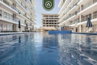 New 2 BR Condo One Street From Beach - Pool - Gym - 0