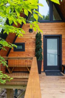 Designer A-Frame Treehouse with hot tub on river - 5