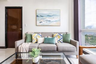 Furnished 2BR Top Floor Condo Minutes to Beach with Amazing Sea View, Netflix, WiFi and Pool Access - 1