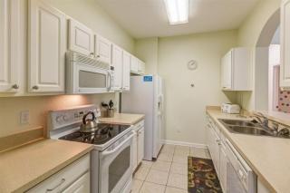 GROUND FLOOR OVERSIZED CONDO - NEXT TO DISNEY! #104 - 1