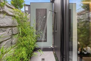Boutique Coastal Retreat with Bath Walk to Beach - 1