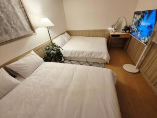 군자역 5분, 침실 2개, 퀸침대 3개, 최대인원 6명 - 9