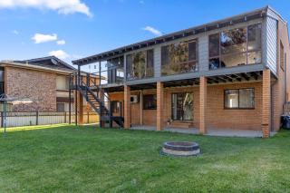 San Remo Charm with Waterfront Views and Sunroom - 9