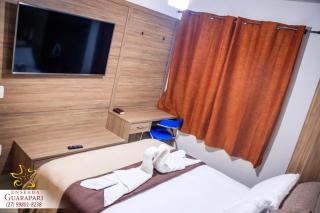 CONFORTO IMBATIVEL - 25 metros do MAR - 2 Quartos com AR CONDICIONADOS SPLIT, Air Fryer, WI-FI, Disney Plus, Star Plus, HBO Max, Guarda Sol, Cadeiras de Praia e Caixa Térmica - 8 pessoas com Muito Conforto - Melhor Localização! - 7