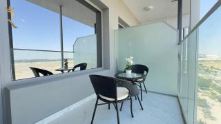 Dove 2BR Modern Poolside Stay - Walk to Masdar Park & City Centre Mall - 2