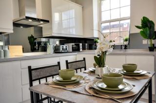 Cosy Wigan Apartment with Sunny Views - 1