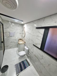 Aconchego Paraíso 2 Shopping com Garagem e Suíte - 1