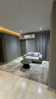 Modern Cozy Apartment with Elegant Gray Design & Smart Lighting - 2