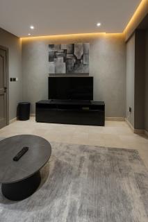 Modern Cozy Apartment with Elegant Gray Design & Smart Lighting - 3