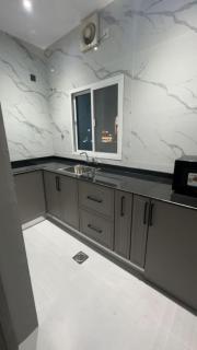 Modern Cozy Apartment with Elegant Gray Design & Smart Lighting - 4