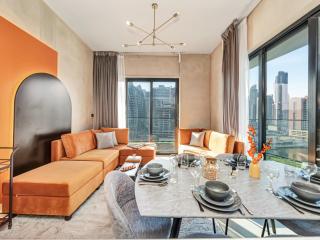 Binghatti Canal 2 Bedroom Suite with Burj Khalifa View, Spacious Balcony, and Infinity Pool - 1