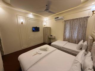White Rose Guest House - Nueplex - Agha Khan - Airport Karachi - 3