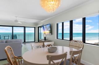 Updated direct oceanfront corner condo with large wrap-around balcony and heated pool - 0