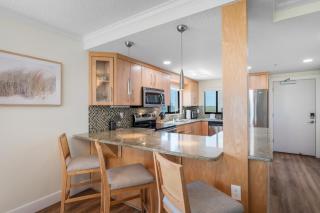 Updated direct oceanfront corner condo with large wrap-around balcony and heated pool - 1