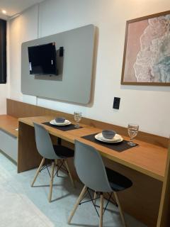 Studio na praia Piscina, academia e lavanderia - 1