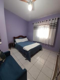 Suíte em casa compartilhada a poucos metros da praia - 8