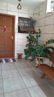 Suíte em casa compartilhada a poucos metros da praia - 4