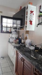 Suíte em casa compartilhada a poucos metros da praia - 1