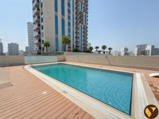 Vogue One Bedroom Apartment with balcony, access to amazing Pool, Kids Area, located Jumeirah Village Circle JVC - 0