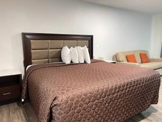 Garden Inn & Suites - 1