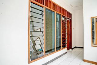 SPOT ON 93475 Garuda Homestay Syariah - 9