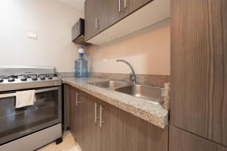 Elegant, 2-Bedroom Retreat in Naco Central - 1
