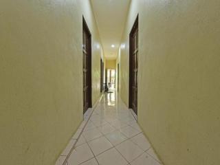 OYO 90596 Casaria Inn - 8