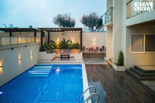 StayVista at Oriana Palms with Wifi and Pool - 1