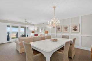 Ground floor direct oceanfront with a large patio, pool, and covered parking - 8