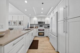 Ground floor direct oceanfront with a large patio, pool, and covered parking - 4