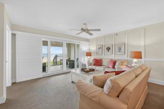 Ground floor direct oceanfront with a large patio, pool, and covered parking - 2