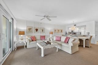 Ground floor direct oceanfront with a large patio, pool, and covered parking - 1