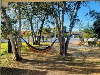 Casa aconchegante com pátio grande - 1 km da Praia - 9
