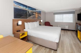 Days Inn & Suites by Wyndham Arlington Heights - 1