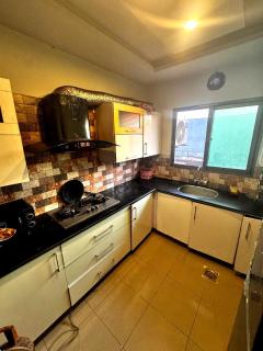 Modern 3BR Gaming Apartment E-11 Islamabad AC, LED, Kitchen - 2