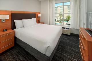 TownePlace Suites Orlando at FLAMINGO CROSSINGS Town Center, Western Entrance - 6