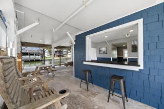 Texan Waterfront Retreat with Boat Slip, Fire Pit, Game Room and Outdoor Shower - 2