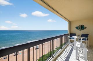 Renovated direct oceanfront condo with spacious balcony, heated pool, and garage parking - 9
