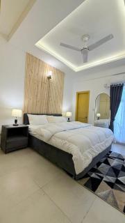 Cozy Grey Modern Apartment in the Heart of Islamabad - 5