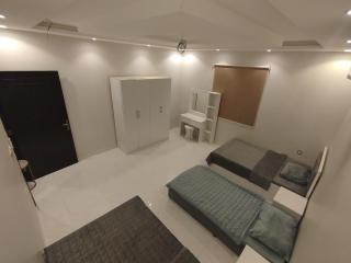 Salam Apartments 2 Two bedrooms, a hall, two bathrooms, and a kitchen C - 1