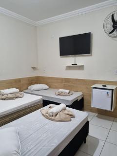 Pousada Quarto Standard com ar ,tv Wi-Fi Garagem gratuita - 0