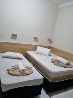 Pousada Quarto Standard com ar ,tv Wi-Fi Garagem gratuita - 9