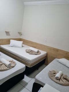 Pousada Quarto Standard com ar ,tv Wi-Fi Garagem gratuita - 7