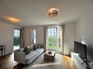 HolidayHome Apartments I Airport Deluxe Condo with Terrace - 8