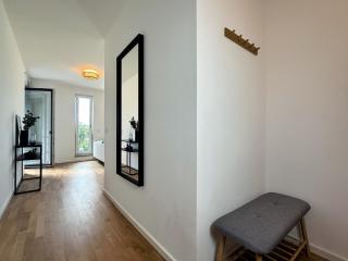 HolidayHome Apartments I Airport Deluxe Condo with Terrace - 7