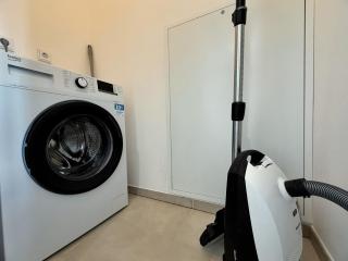 HolidayHome Apartments I Airport Deluxe Condo with Terrace - 1